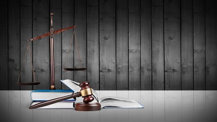Law scales on table background. Symbol of justice