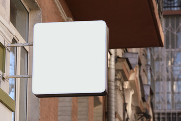 Blank signboard on facade of building