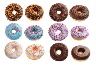 Set of tasty donuts on white background