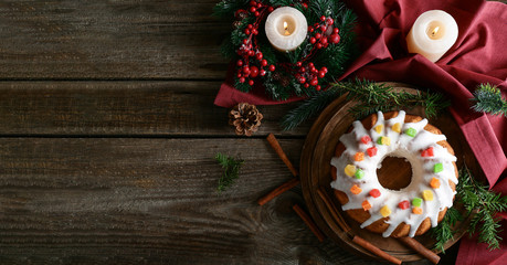 Beautiful tasty Christmas pie on wooden table