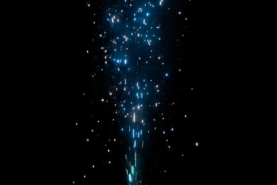 Sparks sparkling into the night sky, blending overlay © Jacob