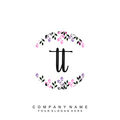 letter TT surrounded by beautiful and elegant flowers and leaves. Wedding monogram logo template. Fashion Logo template Vectors,