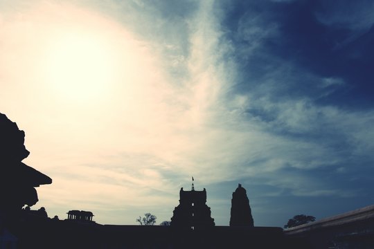 silhouette of city at sunset