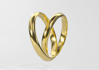 heart symbol wedding rings on white background
