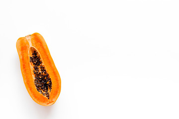 Exotic fruit. Papaya on white background top view copy space