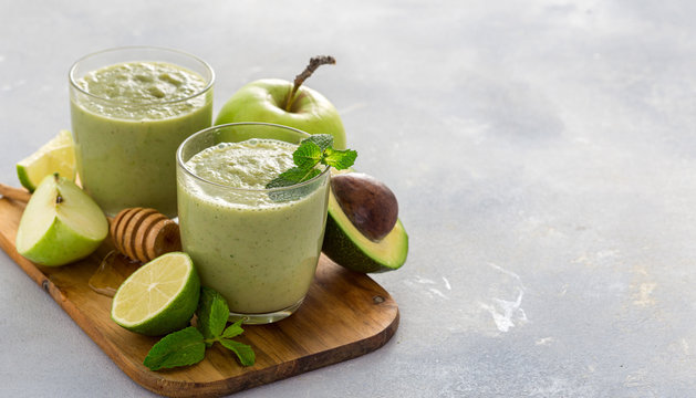 Healthy clean eating concept Fruit green smoothie on a table with copy space