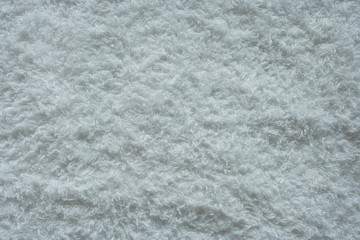 Fototapeta na wymiar Background material. A white bath towel