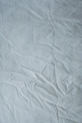 Background material. A white wrinkled sheet.