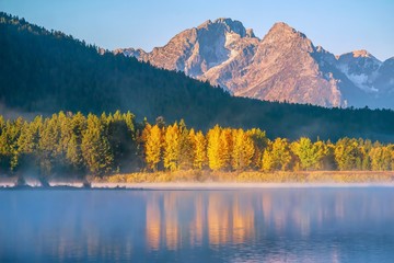 An early morning autumn landscape scene at Oxbow Bend in Grand Teton National Park.