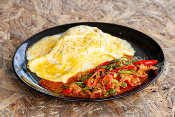 Creamy Omelet with hot and spicy beef panang curry on jusmine Rice