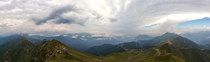 mountain landscape on a cloudy summer day - panorama over the observation deck on the top of Kamenny Pillar (2502m) - Aibga mountain range, Western Caucasus, South of Russia