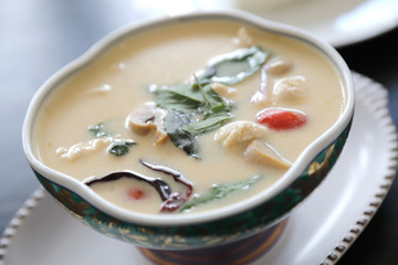 Coconut milk soup with chicken and rice , traditional Thai food