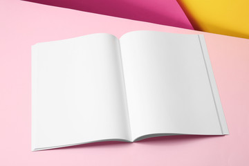 Empty book pages on color background. Mockup for design