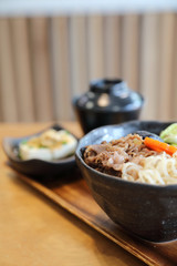 Sukiyaki donburi , sukiyaki hot pot stew with Japanese rice in bowl Japanese food