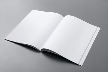 Empty book pages on grey background. Mockup for design