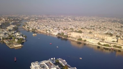 Aerial view Drone 4k of Lake Pichola And City Palace, Udaipur, Rajasthan, India