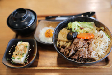 Sukiyaki donburi , sukiyaki hot pot stew with Japanese rice in bowl Japanese food