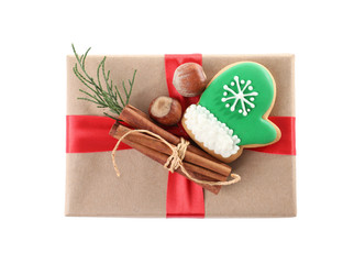 Christmas gift box with decoration on white background, top view