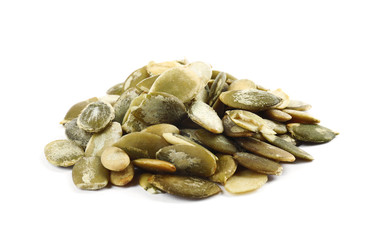 Pile of raw pumpkin seeds on white background