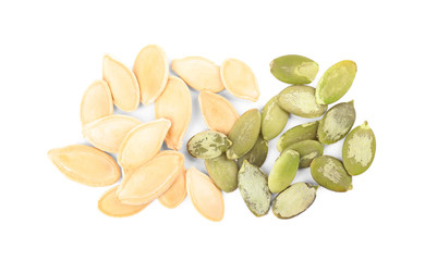 Pile of raw pumpkin seeds on white background, top view