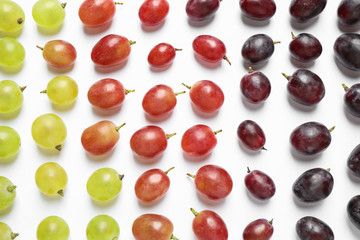 Fresh ripe juicy grapes on white background, top view
