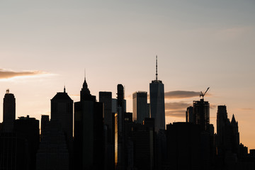 Fototapeta na wymiar Cityscape with high-rise buildings at dusk
