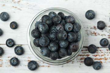A glass bowl with blueberry	