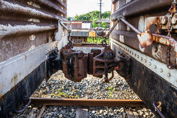 Closeup of Old joint container on railroad that has rust.
