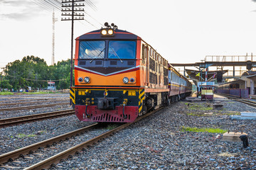 Trains of Thailand is moving into the station by diesel engine. Retro technology