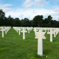 view of Christian and Jewish headstones in the American Cemetery at Omaha Beach in Normandy