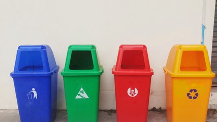 colorful recycle bins in the park 