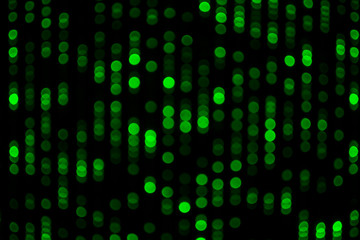 Abstract beautiful blurred or softy bokeh of fresh green LED lighting. Group of blurry ornamental lights flickering. Background for digital data transformation or energy saving or Sci-fi concept.