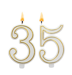 Burning birthday candles on white background, number 35