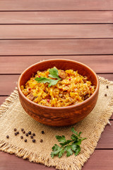 Stewed (braised) cabbage served on ethnic ceramic bowl