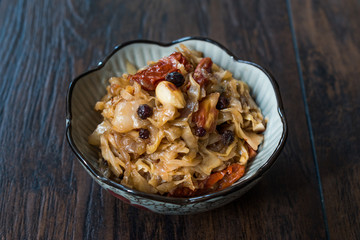 Cabbage Salad with Caramelized Onions, Dried Tomatoes and Currants.