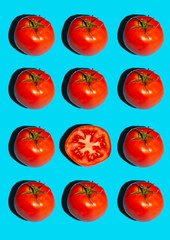 Food pattern with tomato. Creative poster with tomato on blue background. Food flat lay.