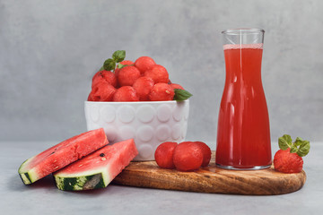 Fruit salad with watermelon balls and mint.  Fresh watermelon vegetarian vitamin juice.