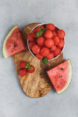 Fruit salad with watermelon balls and mint.  Fresh watermelon vegetarian vitamin juice.