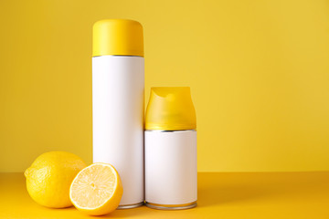 Air fresheners on color background