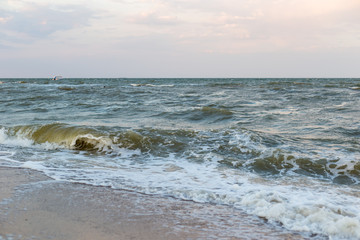 Sea landscape with waves on the water in pastel colors