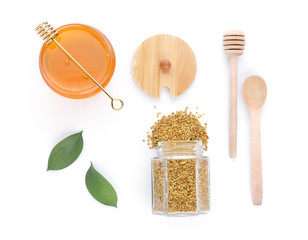 Composition with sweet honey on white background