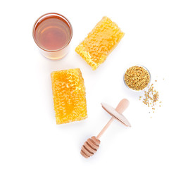 Composition with sweet honey on white background