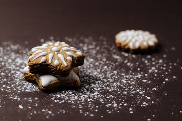 Top view Christmas layout with gingerbread cookies, on a dark background