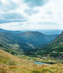 Fototapeta premium Old and beautiful Carpathian mountains. Lake Brebeneskul
