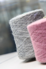 Multicolored bobbins of wool yarn