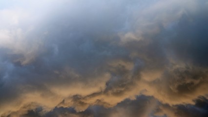 Dramatic cumulonimbus clouds right before and during a thunderstorm over northern europe