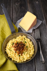 Cheese spätzle on wooden table