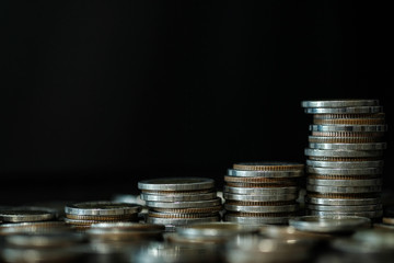 Financial investment concept, Double exposure of city night and stack of coins for finance investor, Forex trading candlestick chart economic , ECN Digital economy, business, Bokeh light.