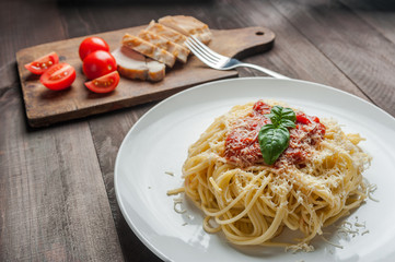 Spaghetti pasta with sauce and chicken