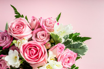 Beautiful and tender bouquet of flowers in the hat box,